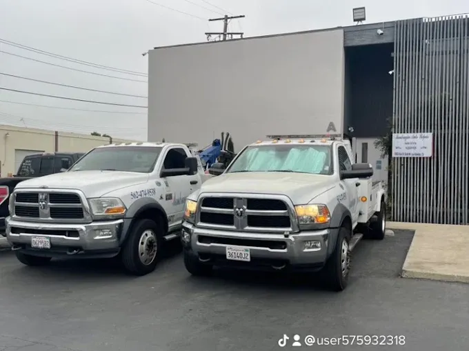 Mondragon Towing trucks parked outside the shop at 10832 Kyle Street Unit A in Los Alamitos