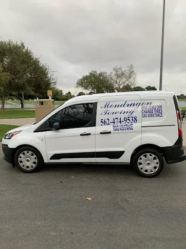 Mondragon Towing roadside assistance van offering lockouts, tire changes and jump starts
